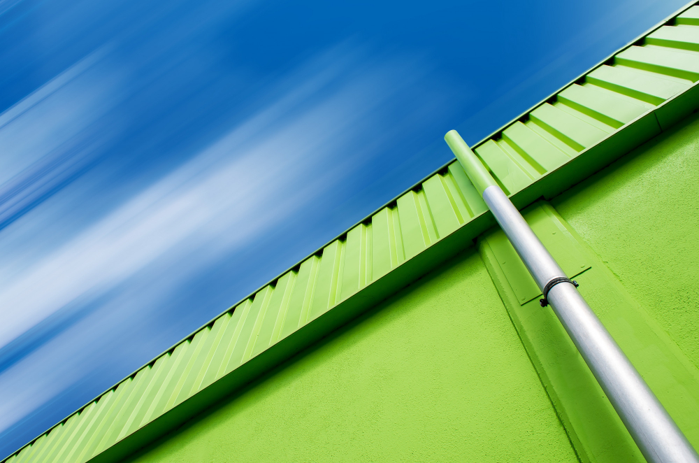 Close-up of roof gutter and downpipe drainage